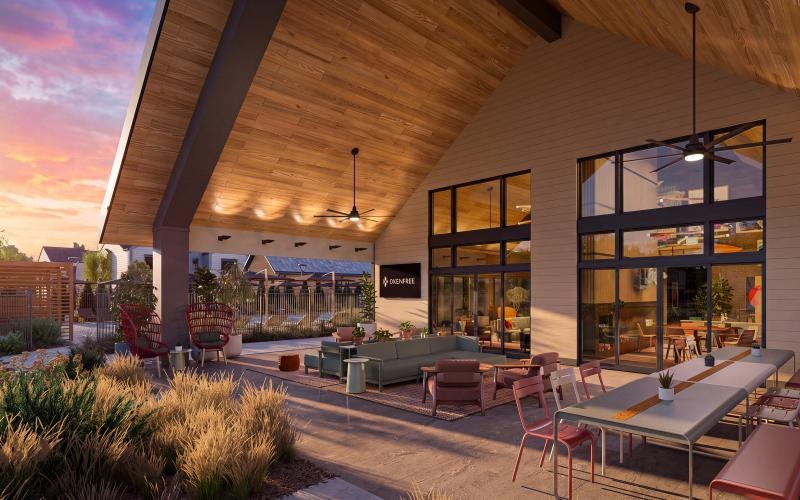 a patio with couches, tables and chairs