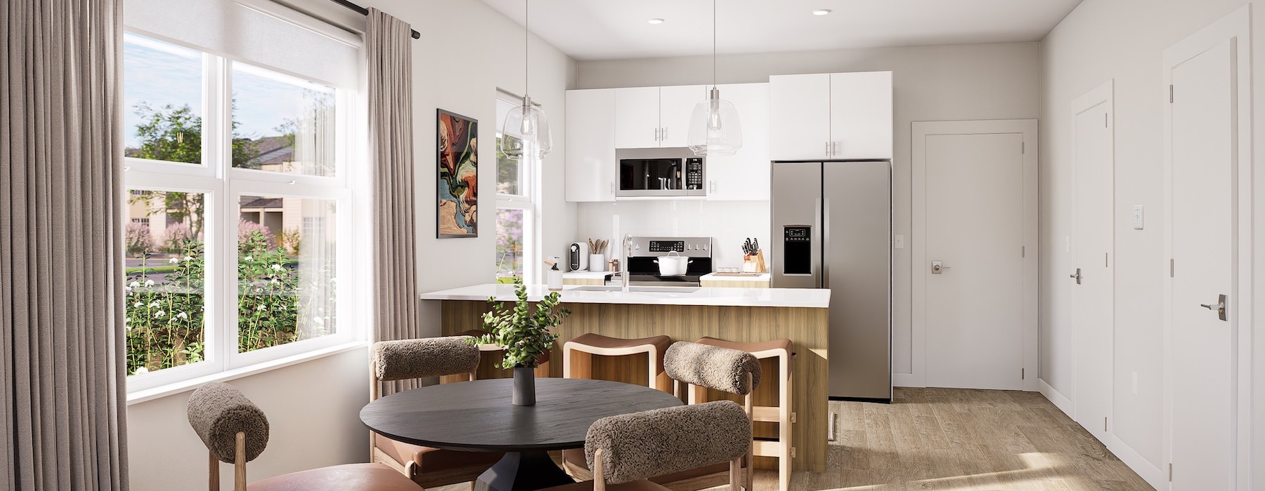 a kitchen with a table and chairs