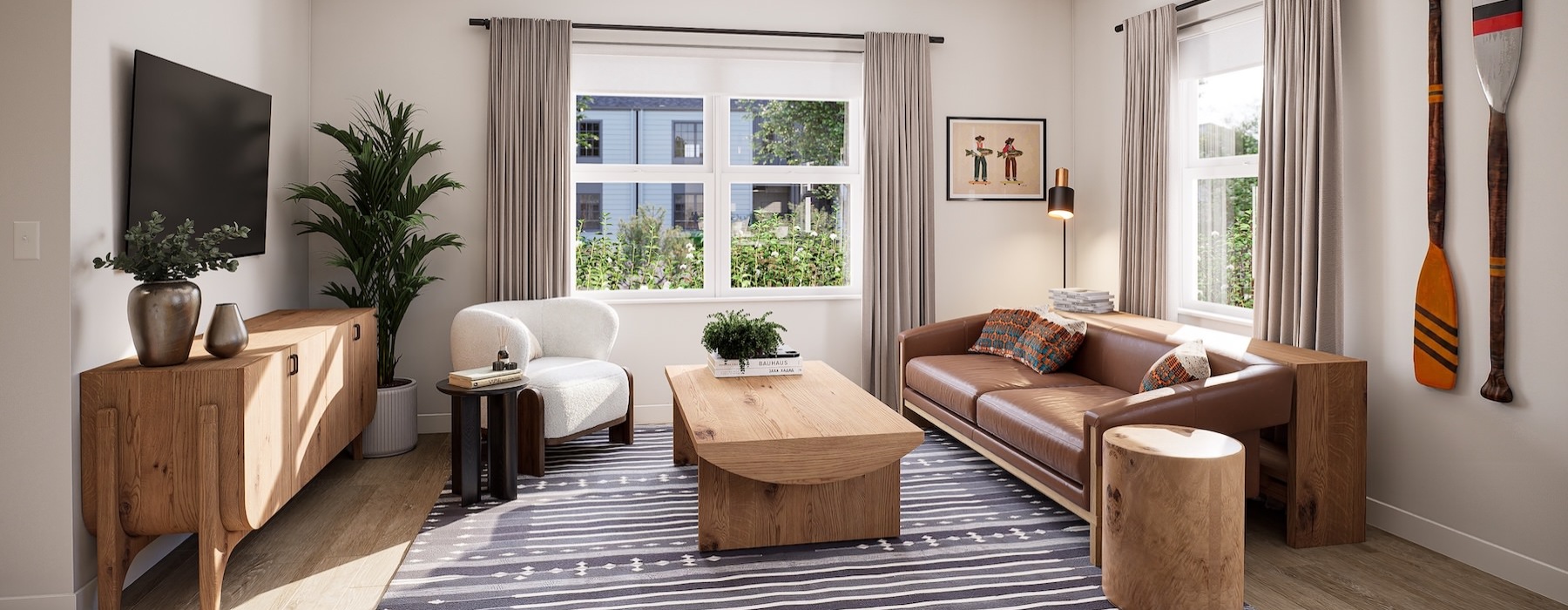 a living room with a couch, tv and a coffee table
