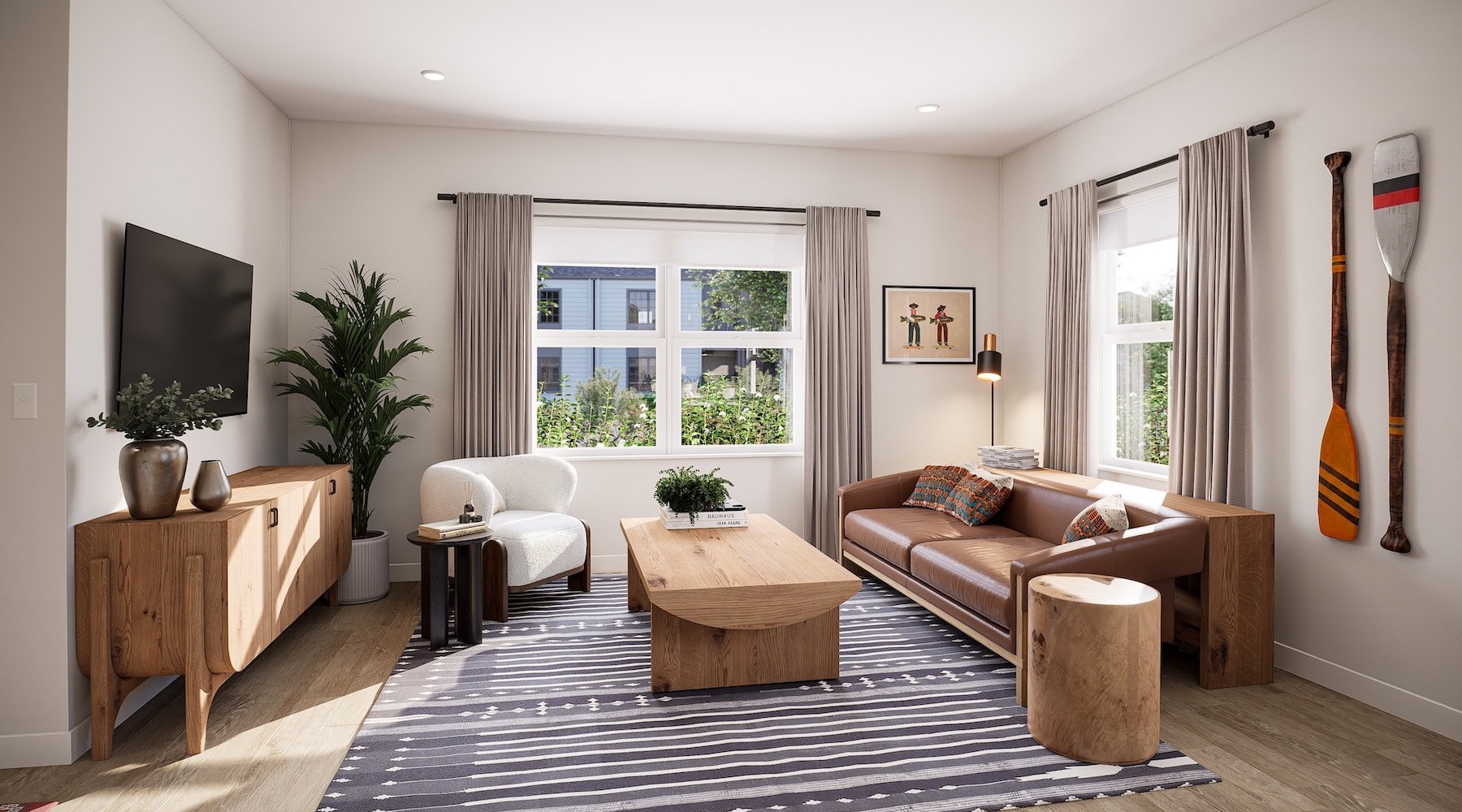 a living room with a couch, tv and a coffee table