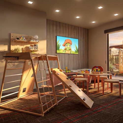 a children's play room with a tv