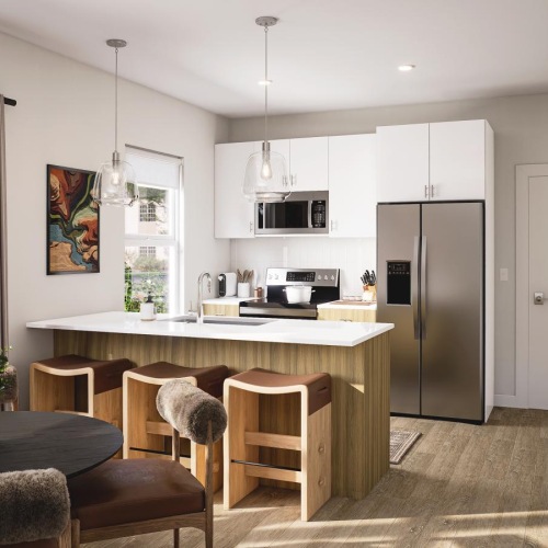 a kitchen with a table and chairs