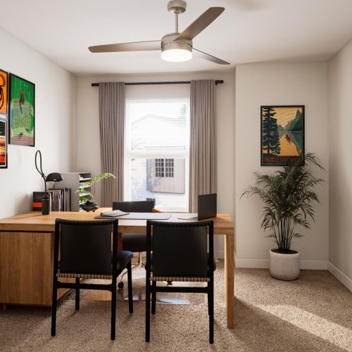 an office with a desk and chairs